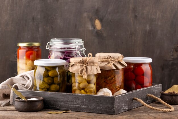 Jars with preserved food assortment