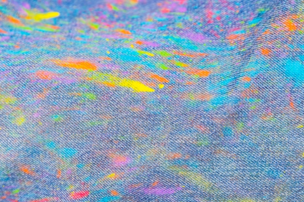 Jeans staining spots of color powder