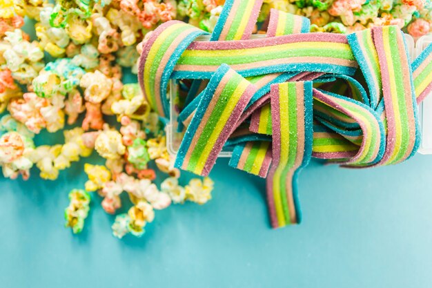 Jelly strips near colored popcorn