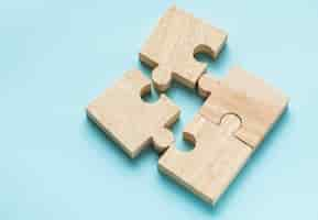 Free photo jigsaw teamwork concept macro shot