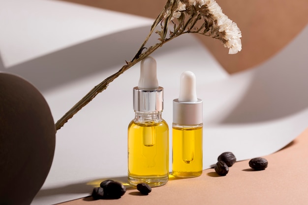 Free photo jojoba oil dropper composition