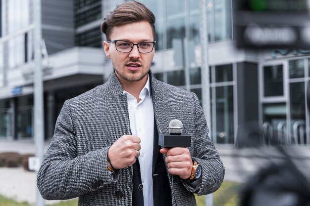 Journalist man filming