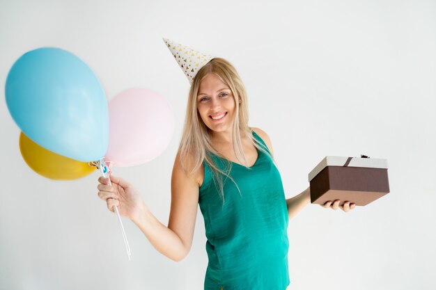 Joyful birthday girl enjoying party