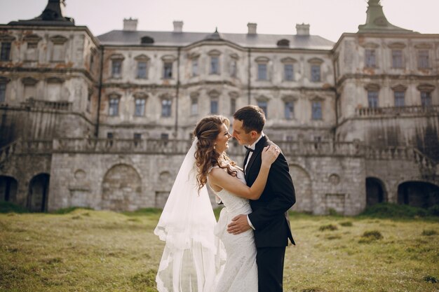 Joyful bride laughing with her husband