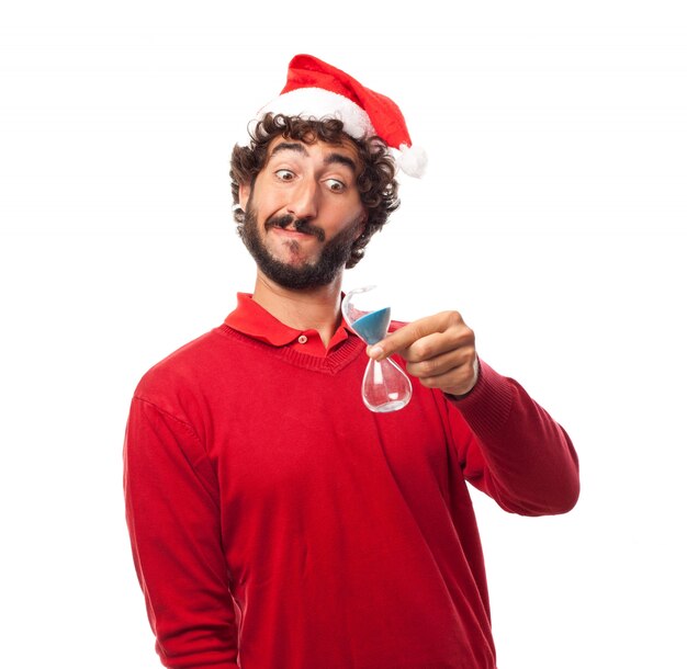 Joyful guy looking at his hourglass