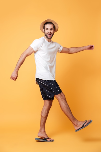 Joyful man making step isolated