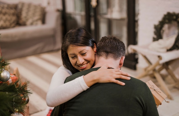 Free photo joyful senior couple hugging with affection