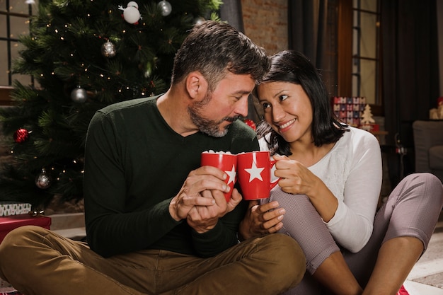 Free photo joyful senior couple starring with affection