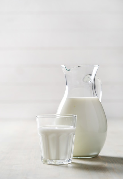 Free photo jug and glass of fresh milk