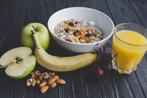 Juice and fruits near muesli