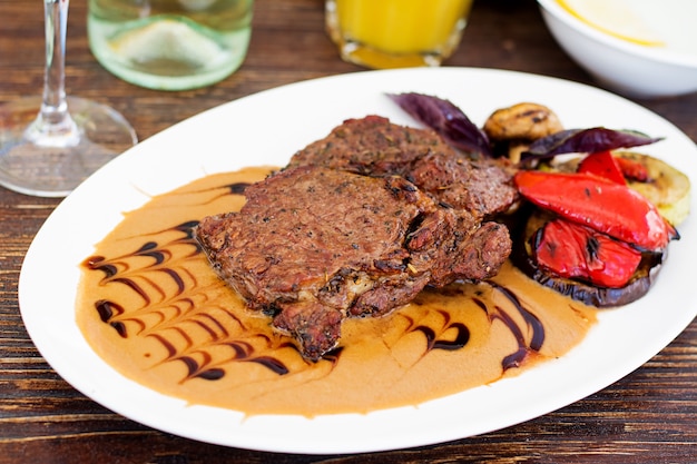 Juicy beef steak with French cream sauce "Duxelles"