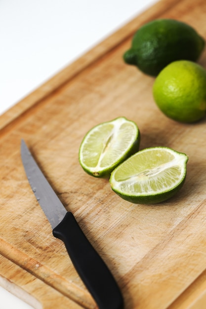 Juicy lime on a wooden cutting board