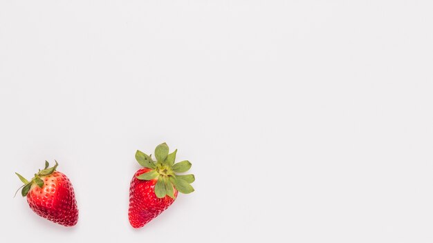 Juicy strawberries on white background