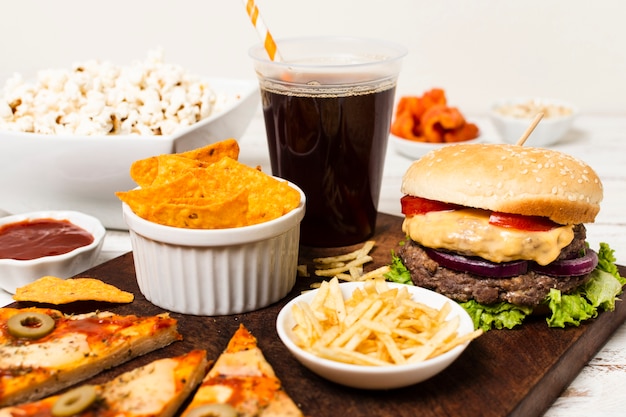 Junk food tray on white table