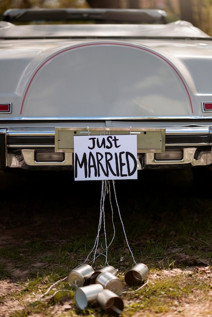 Free photo just married car with cans