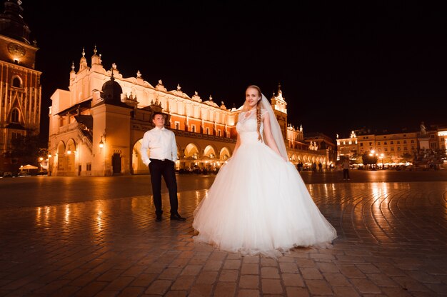 Just married couple night city walk