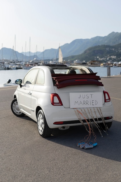 Just married little car on the harbor