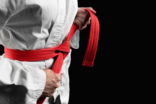 Karate athlete with red belt