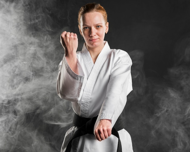 Free photo karate fighter posing medium shot