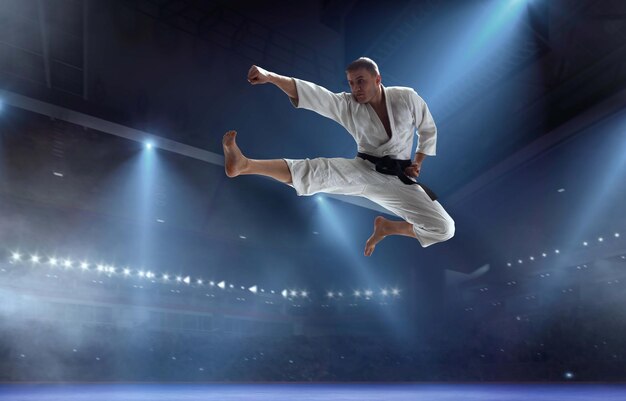 Karate fighters on tatami Fighting Championship