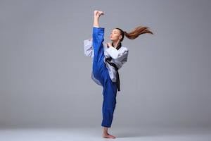 Karate girl with black belt