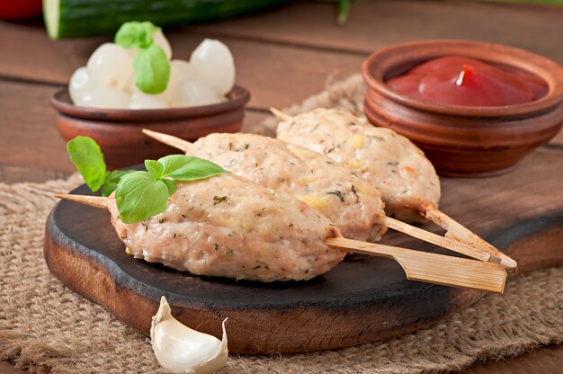 Kebab of minced chicken with dill and parsley