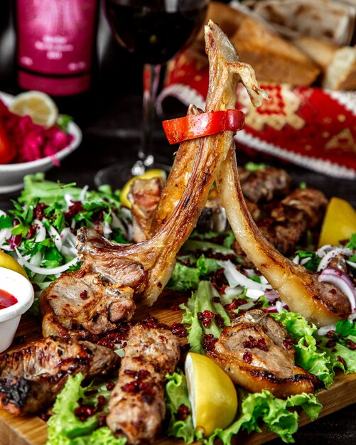 Kebab selection on desk with herbs