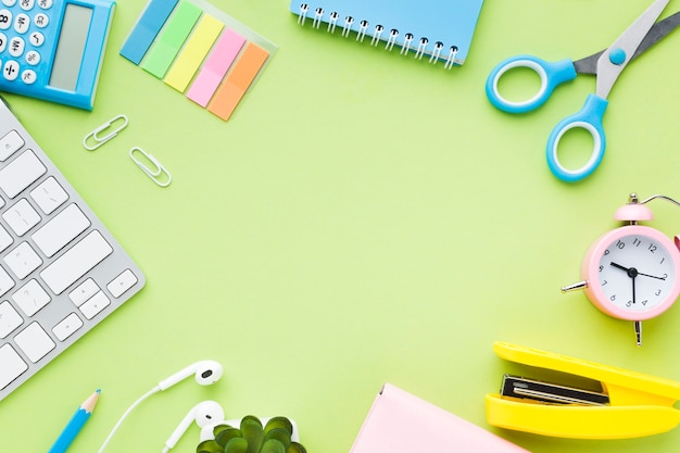 Keyboard and stationery flat lay