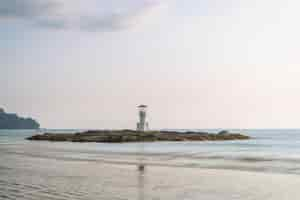 Free photo khao lak beach with light beacon or lighthouse for navigation, f