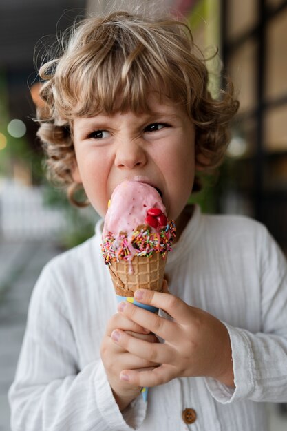 Kid eating ice cream cone