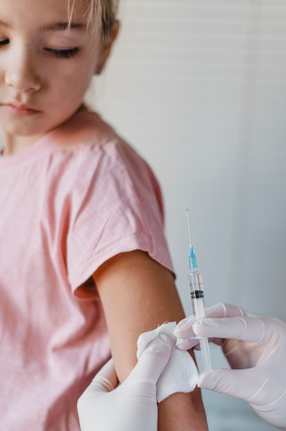 Kid getting a vaccine