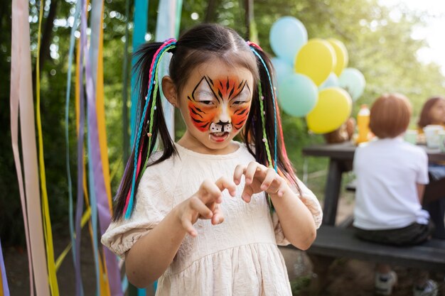 Kid having fun at jungle party