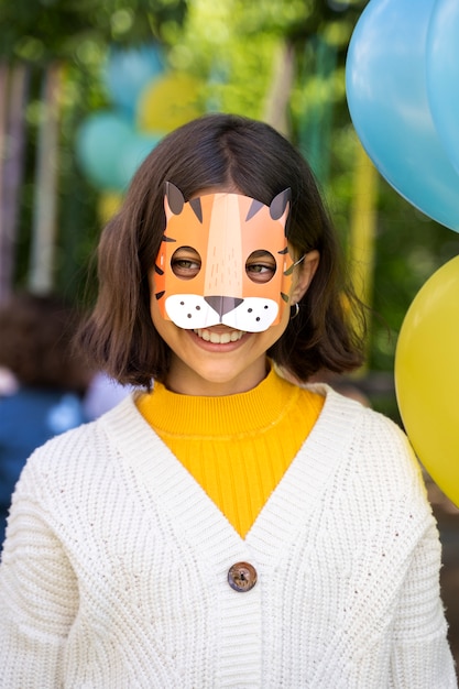 Kid having fun at jungle party