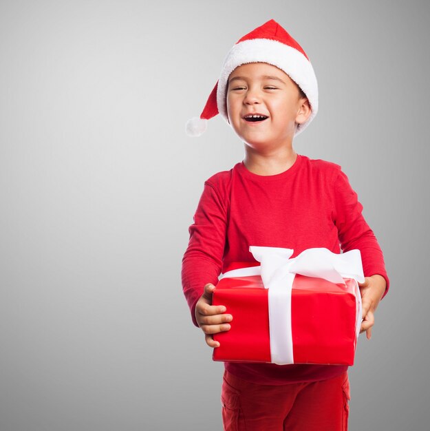 Kid holding a gift