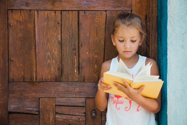 Kid interested in book