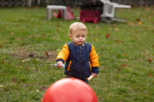 Kid playing outdoorns in the park