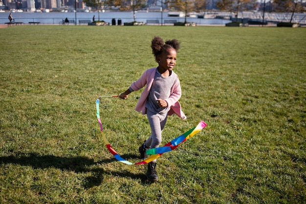 Kid playing outdoorns in the park