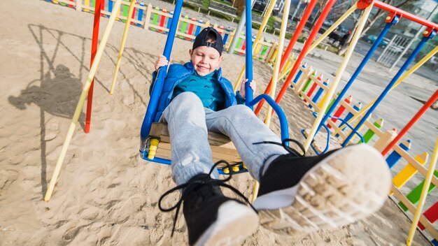 Kid playing outside on playground