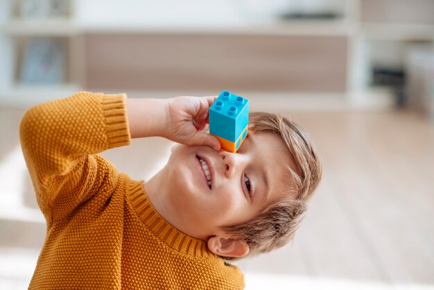 Kid playing with cubes