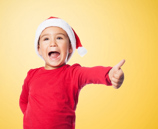 Kid showing a positive gesture