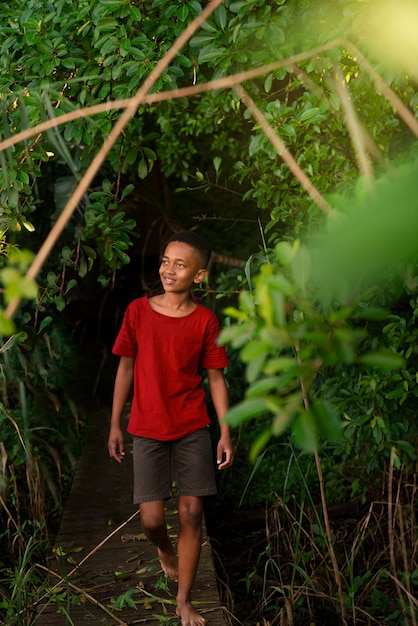 Kid walking in the backyard