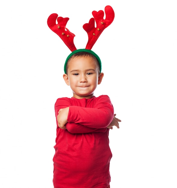 Kid with plush reindeer antlers