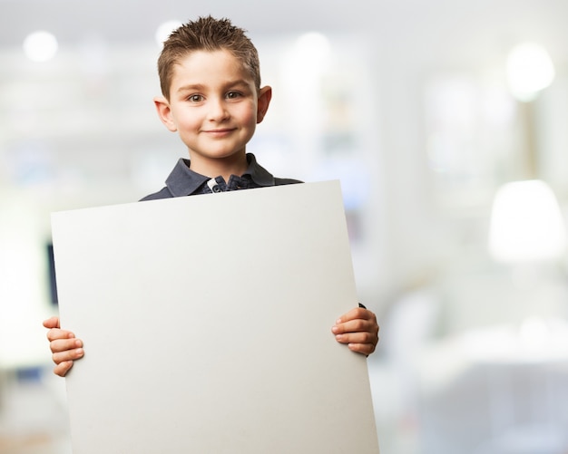 Free photo kid with a poster