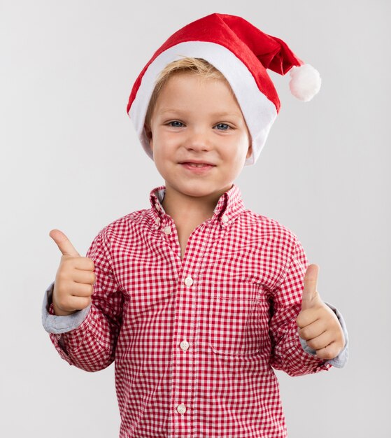 Kid with a santa hat
