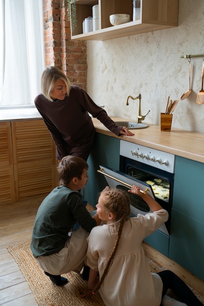 Free photo kids baking cookies full shot