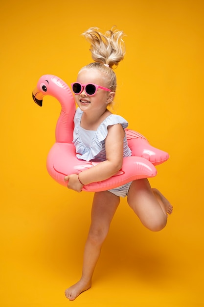 Kids in bikini posing in studio