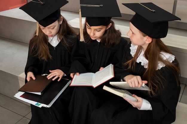 Free photo kids celebrating kindergarten graduation