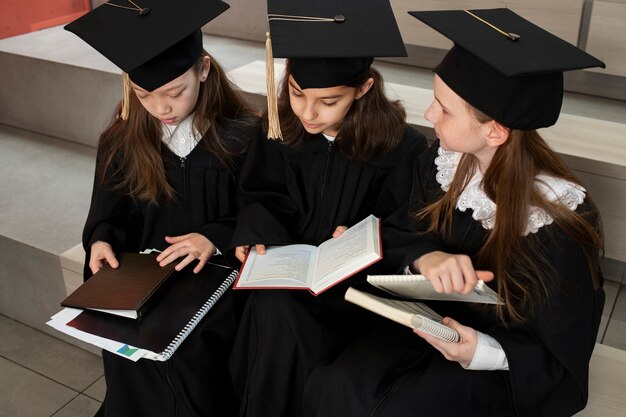 Kids celebrating kindergarten graduation