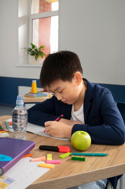 Kids in classroom taking english class