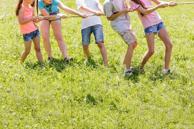 Kids competing in tug of war